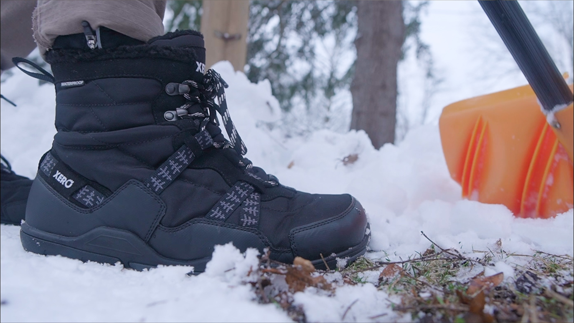 Xero Alpine Shoveling Side Closeup Snow